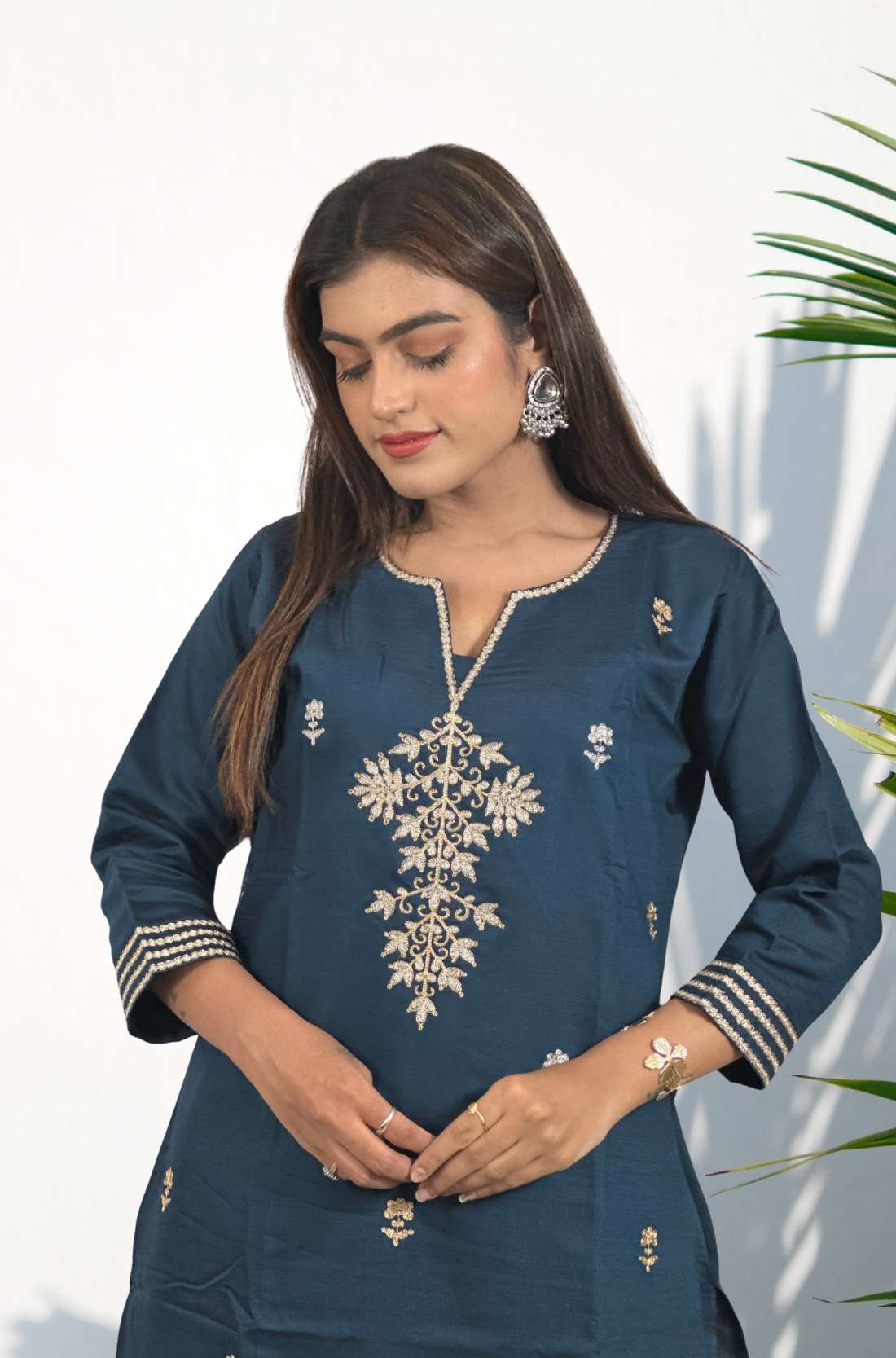 Dark Blue kurta set showing aari work and aari embroidery in main front view