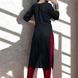 Black hand embroidery and block print a line kurti view from the back.