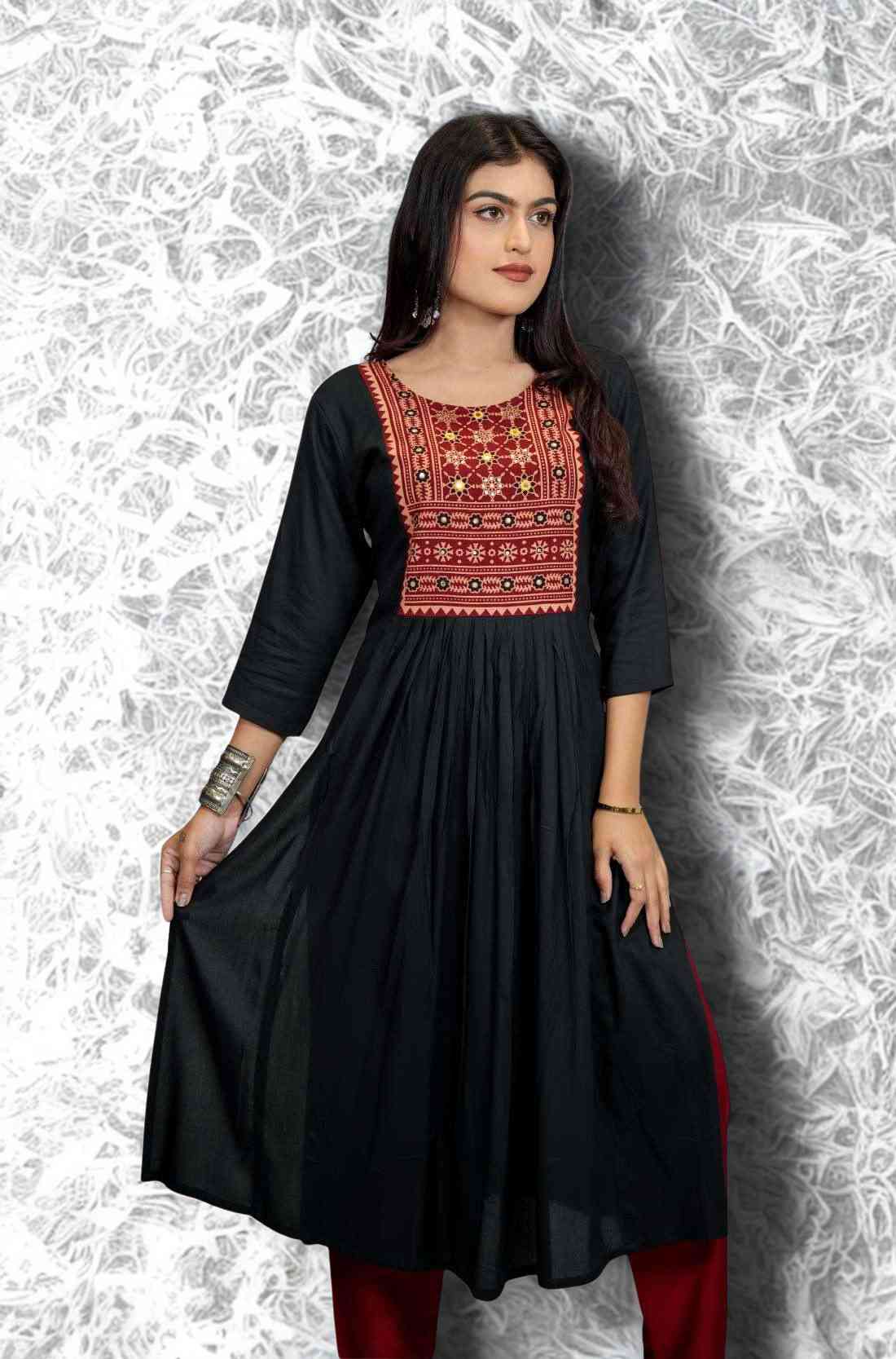 Black hand embroidery and block print a line kurti in showing flare hem.