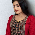 Maroon hand embroidery and block print a line kurta front view.