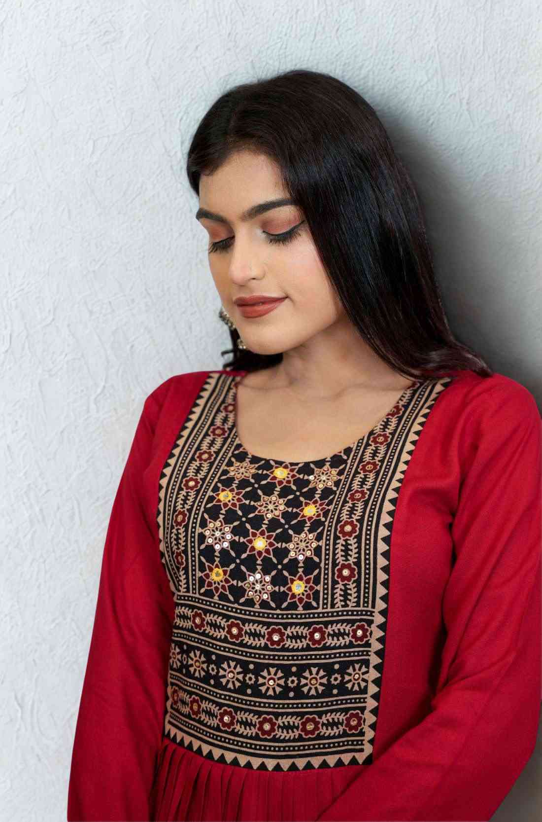 Maroon hand embroidery and block print a line kurta front view.