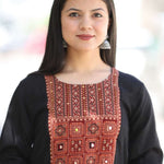 Close-up_pose_in_black_embroidered_A-line_Kurta