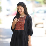Front_side_pose_in_black_embroidered_A-line_Kurta