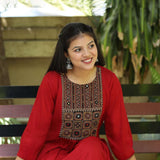 Sitting_pose_in_maroon_embroidered_A-line_kurta