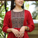Close-up_pose_in_maroon_embroidered_A-line_kurta