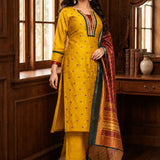 Full-length view of a mustard yellow Vichitra silk kurta set with embroidered kurta, straight-fit pants, three-quarter sleeves, mirror-work neckline, and contrasting printed Chanderi silk dupatta, styled for festive wear.
