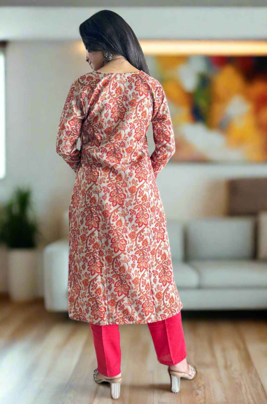Back view of red floral printed kurta.