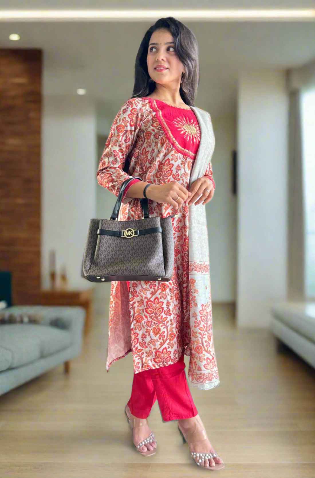 Front view of red kurta with circle print.