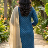 Back view of the royal blue anti-crease crepe kurta set showing the straight-fit silhouette, matching trousers, and elegant gold lycra dupatta with tassel detailing.