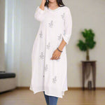 Women Standing wearing White Pure Cotton Kurta Showing the front of the kurta 
