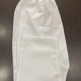 Full view of women's white straight-fit cotton pants with an elastic waistband, ankle-length design, and soft breathable fabric, perfect for pairing with kurtis and ethnic outfits.
