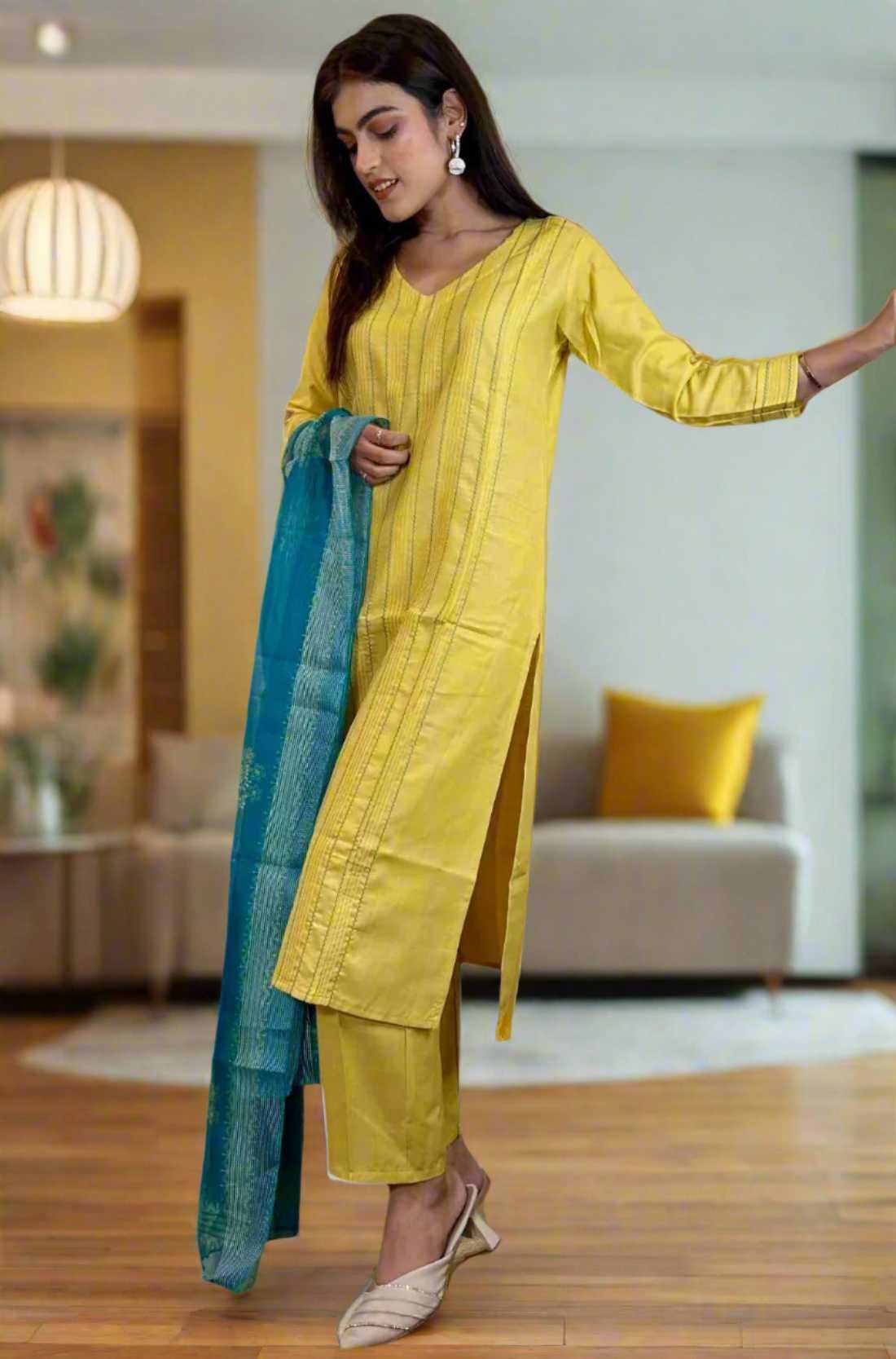Full-length view – of yellow pintuck embroidery kurta set