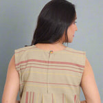 Back neckline detail of beige cotton A-line kurti