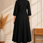Back view of black A-line rayon kurta for women with 3/4 sleeves and flared fit