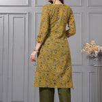 Back view of the mustard yellow straight fit cotton floral kurta set highlighting the clean print alignment