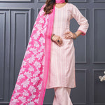 Front profile view of a model in a pink cotton ethnic suit set displaying the straight-cut pants silhouette and the beautiful pattern of the draped matching dupatta