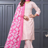 Front profile view of a model in a pink cotton ethnic suit set displaying the straight-cut pants silhouette and the beautiful pattern of the draped matching dupatta