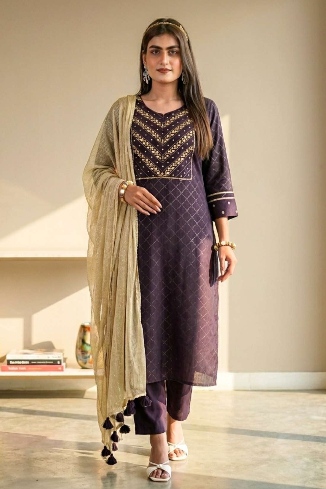 Front full length view of a model in a luxury dark purple crepe hand embroidered suit set with matching pants and an elegant printed dupatta
