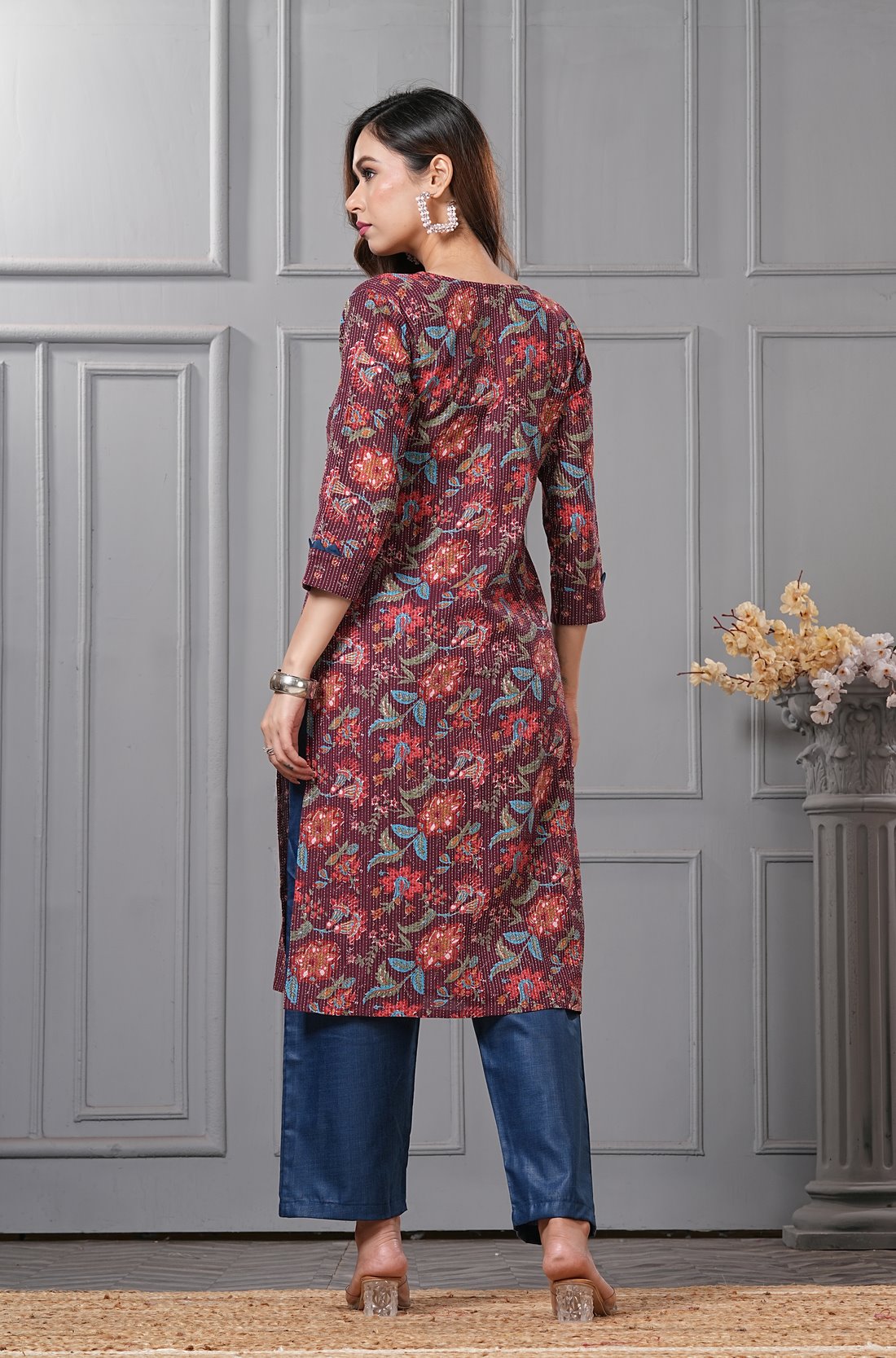 Back view of the straight fit deep mudberry purple cotton floral kurta set showcasing the clean layout and print alignment on the back