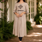 Embroidered beige A-line rayon kurta with cross stitch yoke and 3/4 sleeves, front view