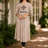 Embroidered beige A-line rayon kurta with cross stitch yoke and 3/4 sleeves, front view