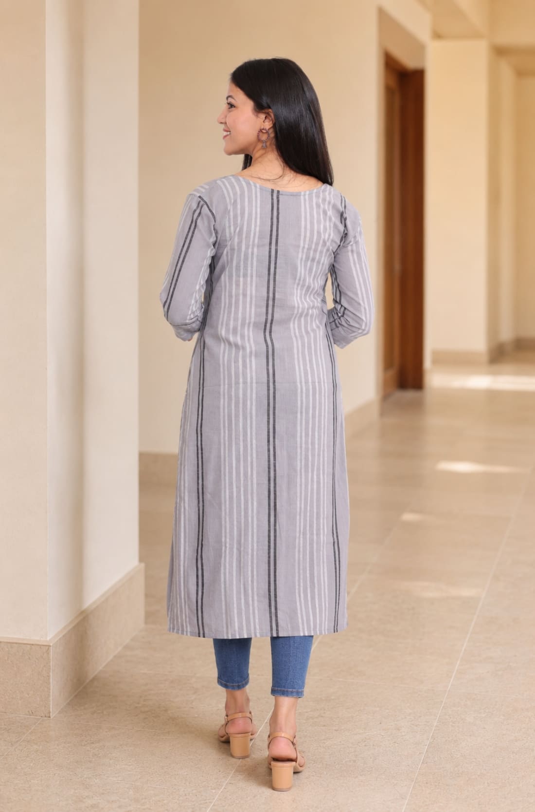 Back view of grey striped A-line cotton kurta with 3/4 sleeves