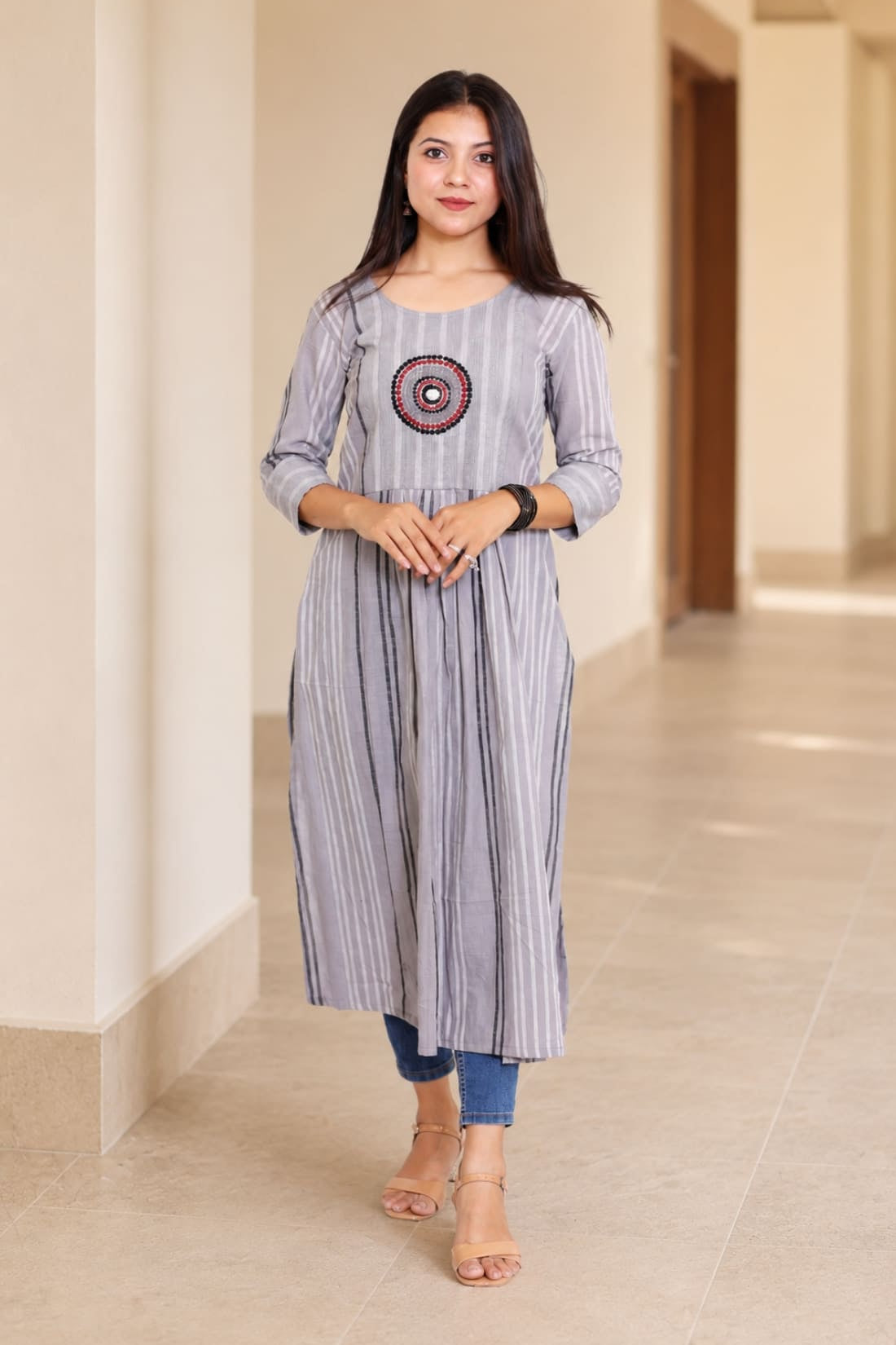 Grey A-line cotton kurta with circular embroidery and 3/4 sleeves, front view