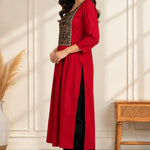 Side view of maroon A-line rayon kurta for women with hand embroidery and block print