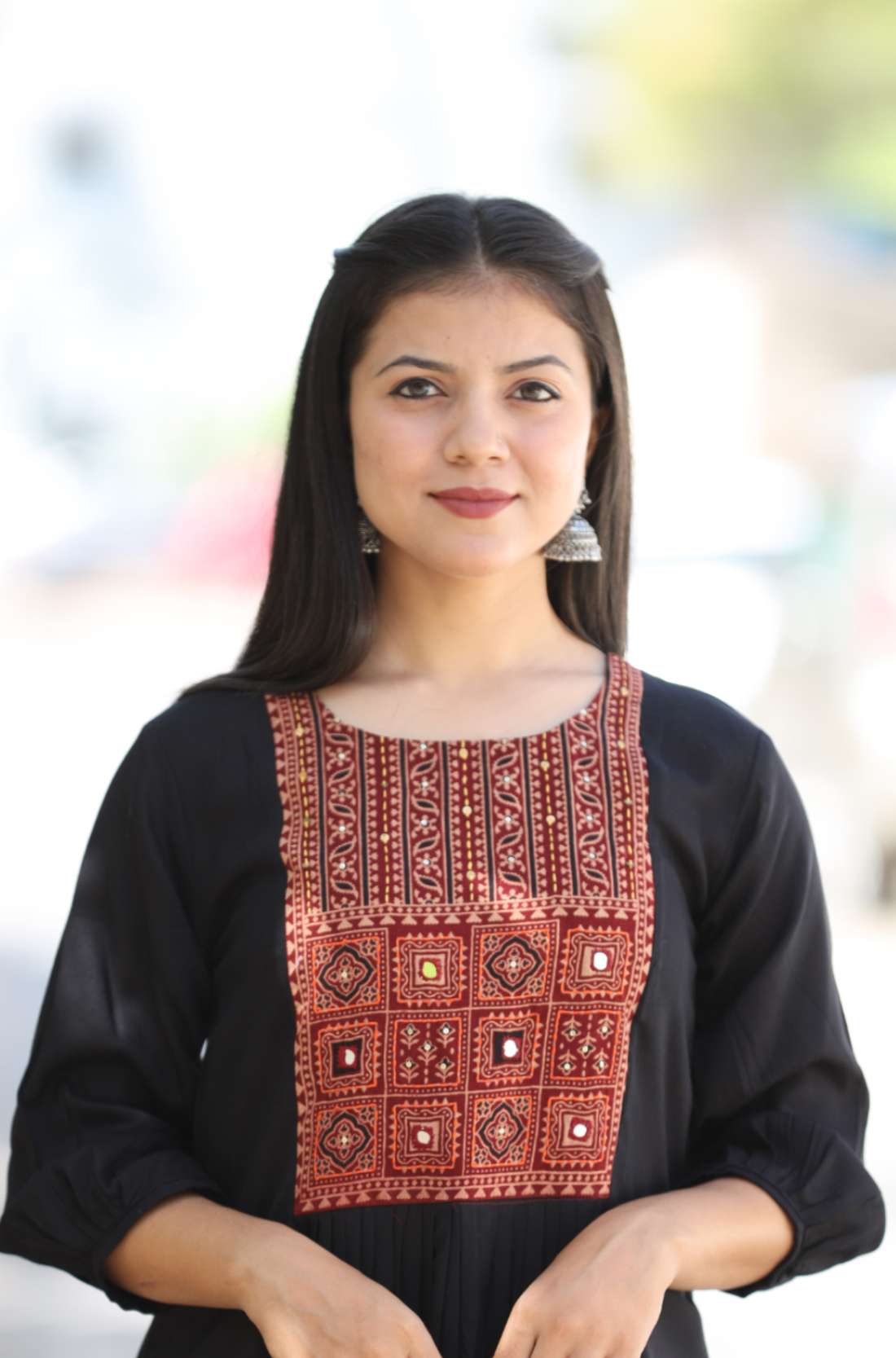 Close-up pose in black embroidered A-line Kurta