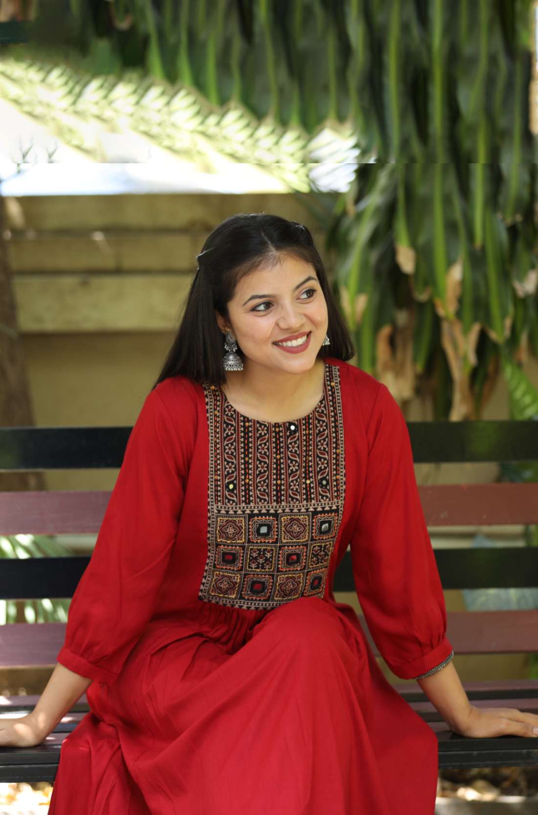 Maroon Rayon Embroidered Aline Kurta – Sitting Pose View