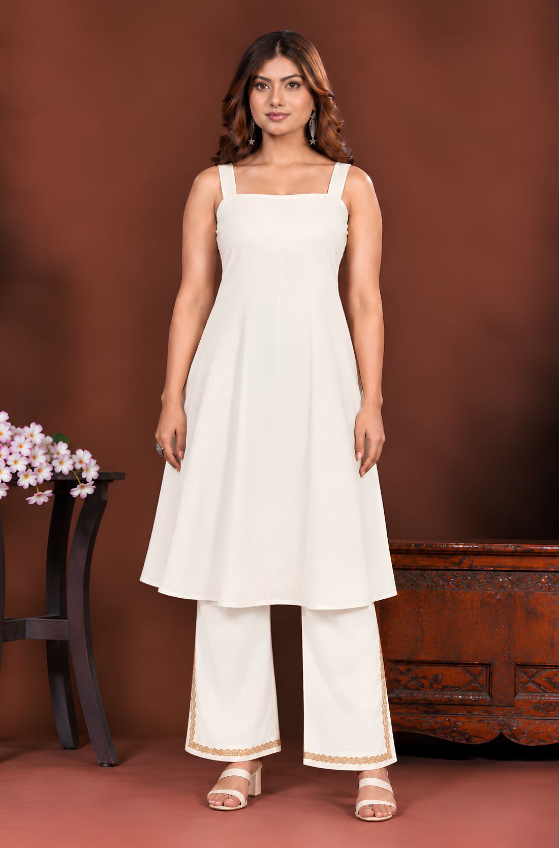 Off white sleeveless A-line inner, front view, included with the kurta set