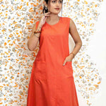 Close-up of pocket on sleeveless orange aline kurta