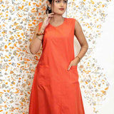 Close-up of pocket on sleeveless orange aline kurta