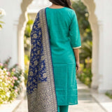 Rear view of the rama green embroidered straight-fit kurta set, showcasing the clean silhouette, straight trousers, and matching dupatta styling from behind.