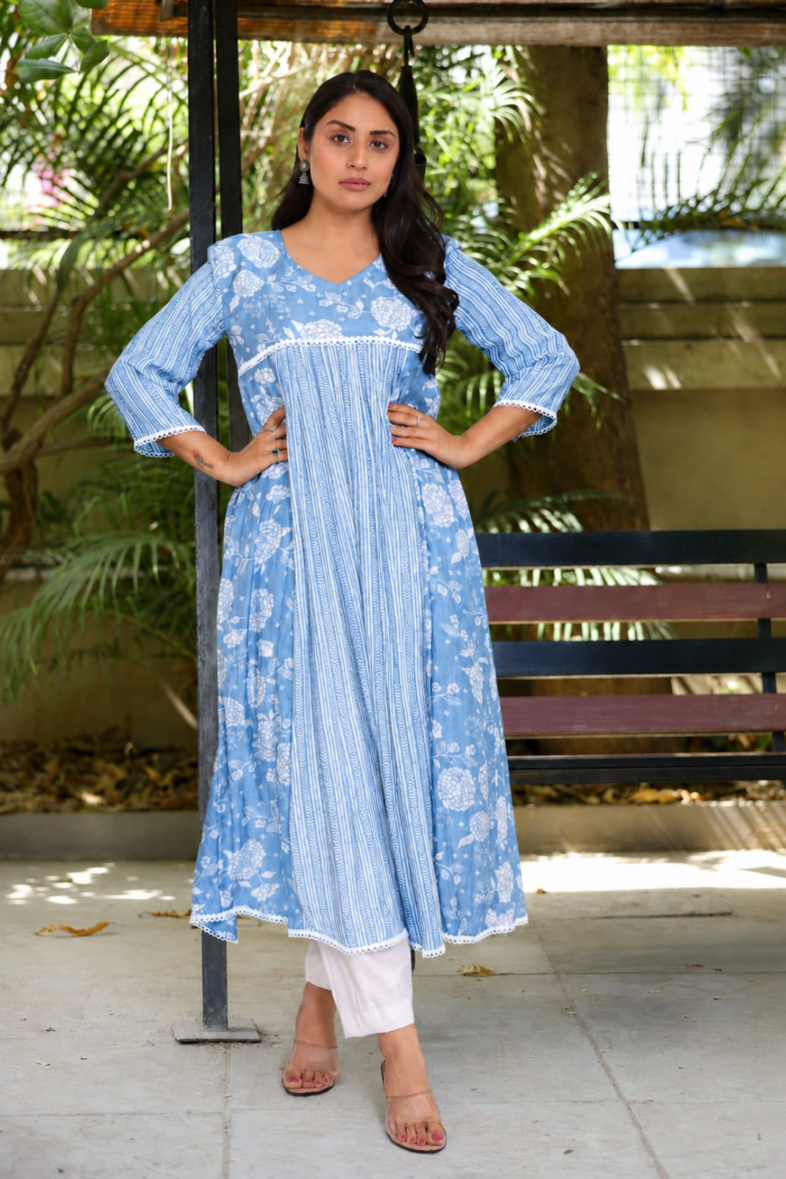 Sky blue white muslin flared kurti with floral geometric print, sitting view