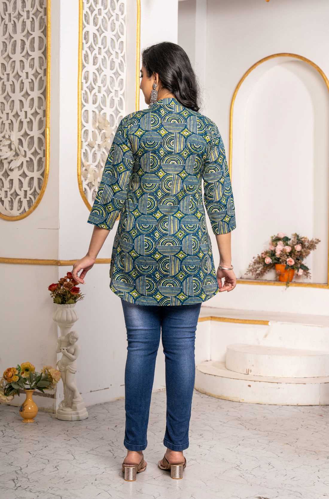 Back view of Women's Geometric Hand Block Print Pure Cotton Shirt Style Kurti in blue and olive green featuring an all-over handcrafted geometric block print and relaxed fit.