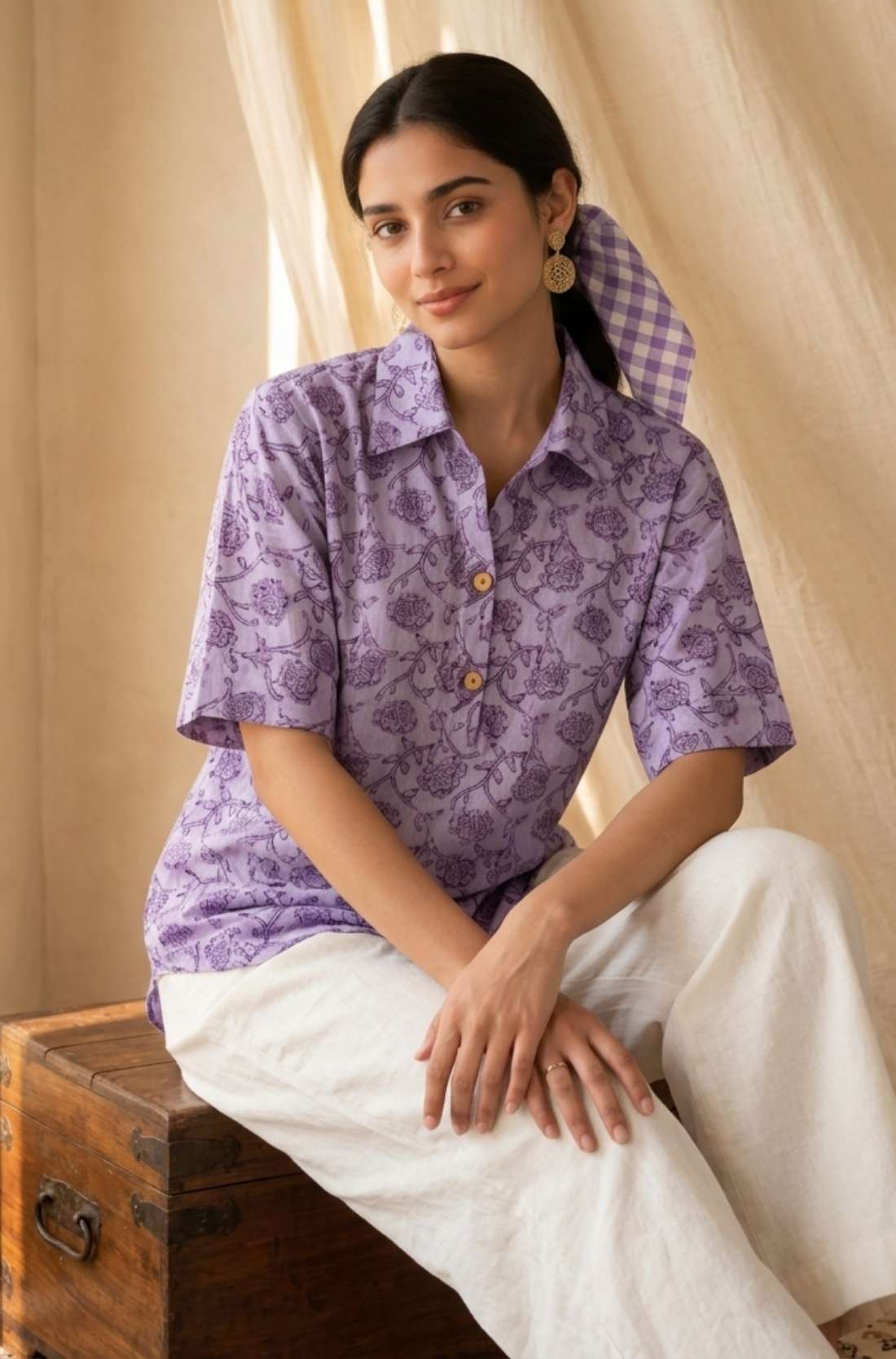 Front view of a women's lavender floral hand block print cotton shirt with relaxed fit and short sleeves.