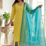 A smiling woman wearing a stylish yellow pure cotton thread embroidered kurta set with a matching printed dupatta