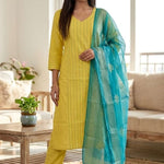 Front full length view of a model in a yellow pure cotton kurta set featuring thread embroidery lines, paired with straight pants and a matching printed dupatta